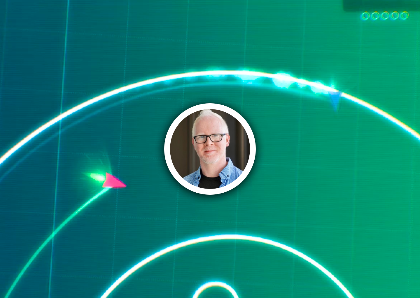 A portrait photo of Dan Vogt, with an in-game screenshot of DATA WING in the background.